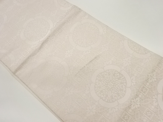 蜀紅錦模様織出し開き名古屋帯（額縁仕立て）